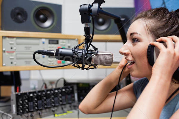 Genç radyo evsahibi mikrofon çalışmak Stok fotoğraf © wavebreak_media