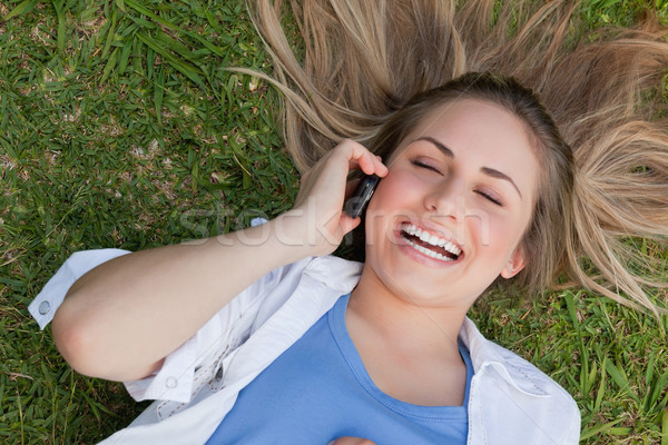 Jeune fille Retour rire parler téléphone portable téléphone [[stock_photo]] © wavebreak_media