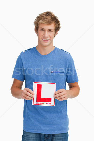 Jungen blond Mann halten Fahrschüler Zeichen Stock foto © wavebreak_media