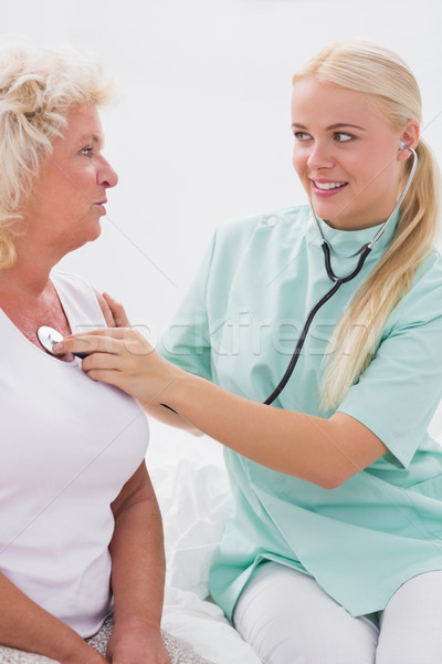 Home nurse and patient talking Stock photo © wavebreak_media