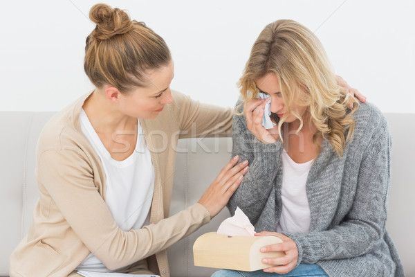 Crying woman talking to her therapist on the couch Stock photo © wavebreak_media