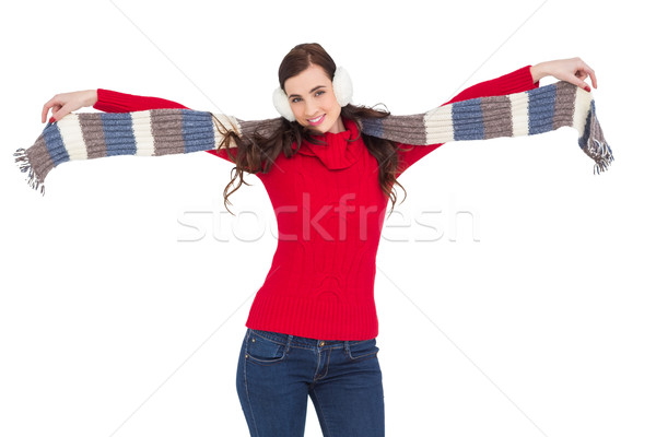 Cheerful brunette holding scarf and spread her arms Stock photo © wavebreak_media