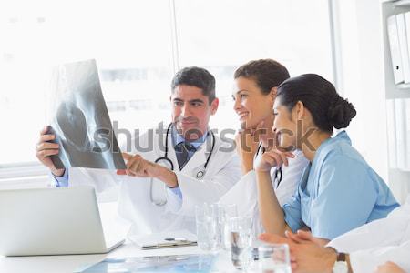 Hard working doctors reviewing notes Stock photo © wavebreak_media