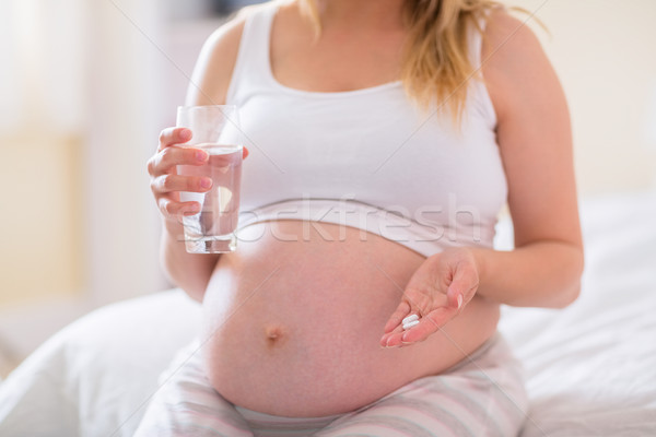 Foto stock: Mulher · grávida · sessão · cama · vidro · água