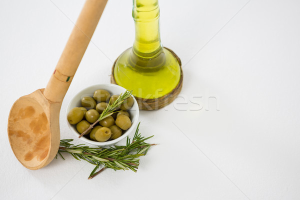 Mariné olives pétrolières bouteille herbe blanche [[stock_photo]] © wavebreak_media