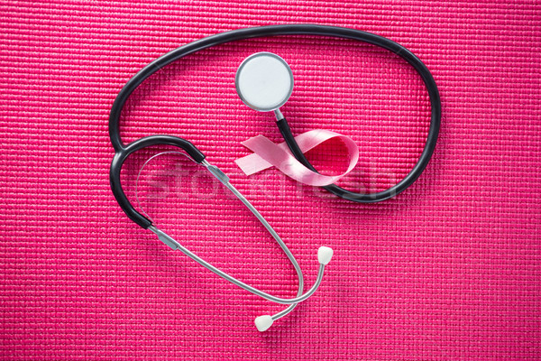 Overhead view of stethoscope by pink Breast Cancer Awareness ribbon Stock photo © wavebreak_media