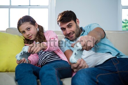 Gay couple comforting each other on the couch Stock photo © wavebreak_media