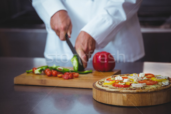Chef slicing vegetables Stock photo © wavebreak_media