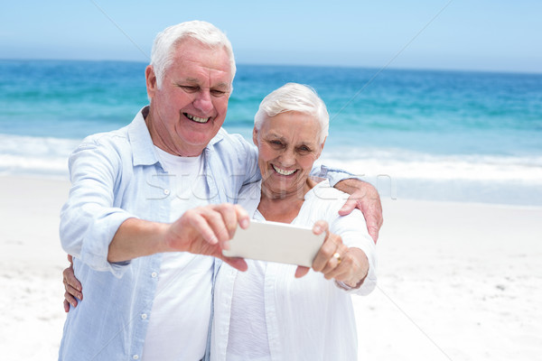 Aufnahme Frau Telefon glücklich Meer Stock foto © wavebreak_media