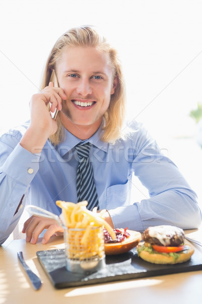 Сток-фото: человека · говорить · мобильного · телефона · завтрак · ресторан · счастливым