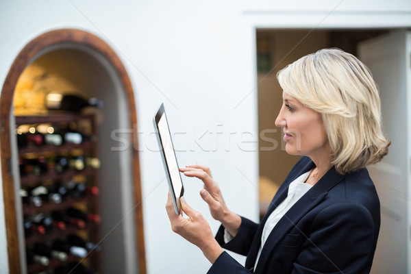 Businesswoman using digital tablet in a restaurant Stock photo © wavebreak_media