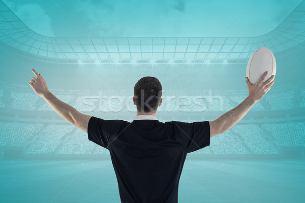 Composite image of rugby player about to throw a rugby ball Stock photo © wavebreak_media