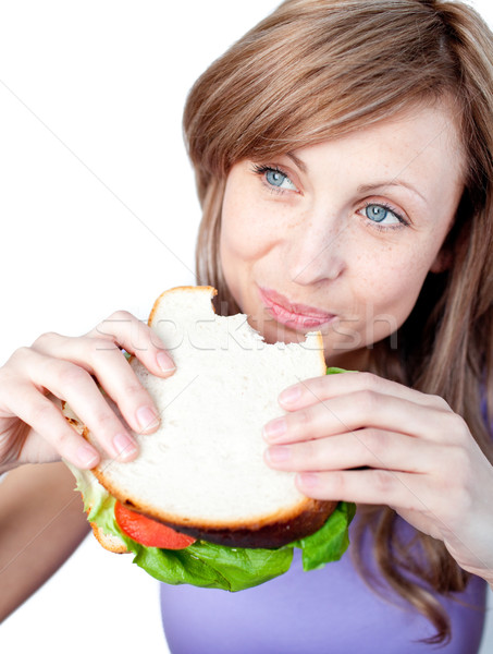 Alegre mujer comer sándwich aislado blanco Foto stock © wavebreak_media