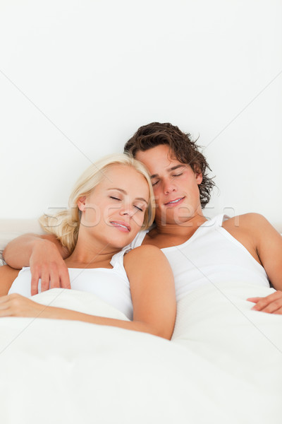 Portré pár alszik hálószoba csukott szemmel férfi Stock fotó © wavebreak_media