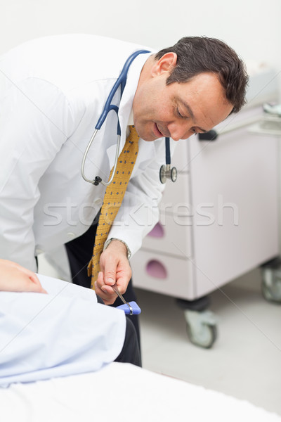 Imagine de stoc: Medic · genunchi · pacient · cameră · femeie