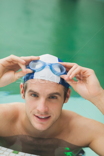 Stockfoto: Glimlachend · man · af · stofbril · zwembad