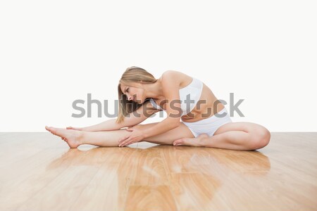 年輕女子 瑜伽姿勢 硬木地板 白 身體 女 商業照片 © wavebreak_media