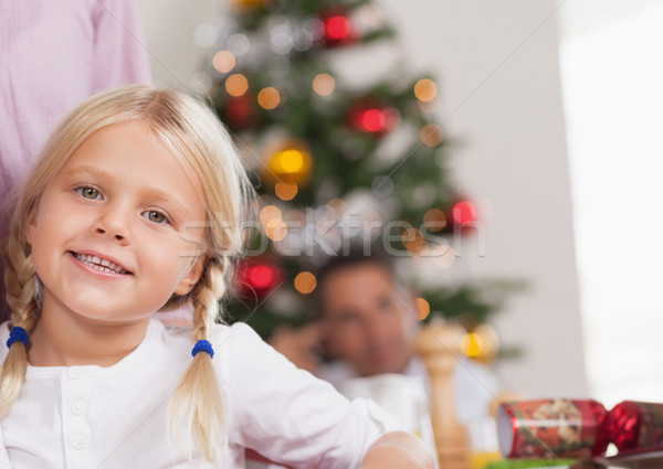 かわいい 少女 笑みを浮かべて クリスマス ディナーテーブル 女性 ストックフォト © wavebreak_media