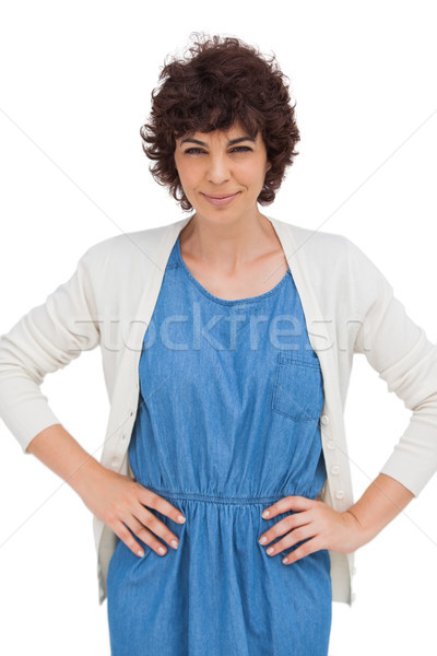 Standing woman placing hands on hips Stock photo © wavebreak_media