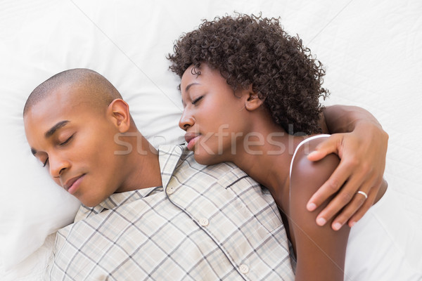 Szczęśliwy para snem bed wraz domu Zdjęcia stock © wavebreak_media
