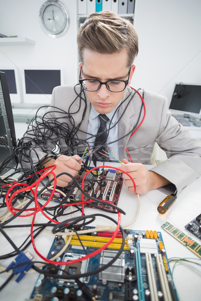 Computer engineer working on broken cables Stock photo © wavebreak_media