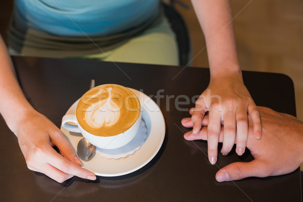Young couple having coffee together Stock photo © wavebreak_media