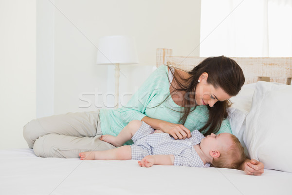 Happy mother with her baby boy Stock photo © wavebreak_media