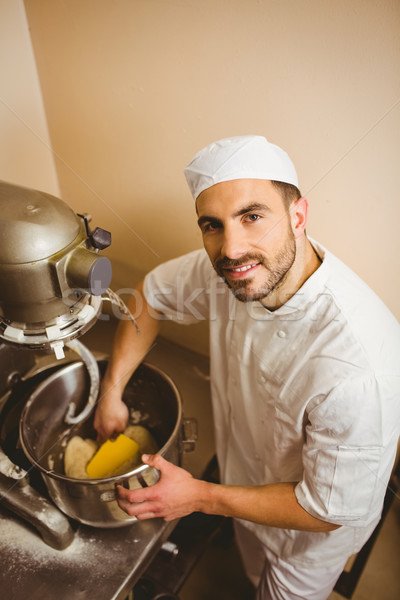 Baker using large mixer to mix dough Stock photo © wavebreak_media