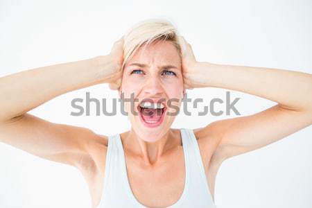 Angry blonde yelling with hands up  Stock photo © wavebreak_media