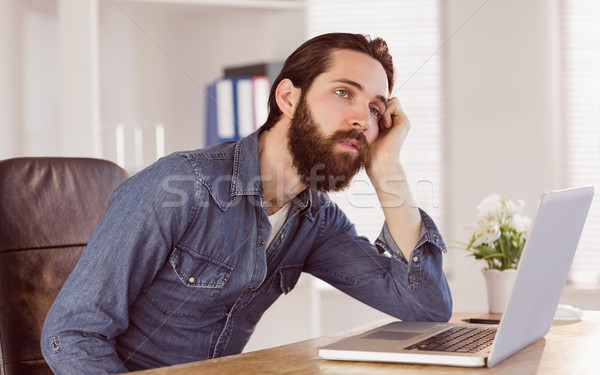 Hipster businessman bored at his desk Stock photo © wavebreak_media