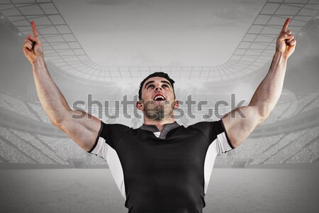 Rugby player cheering and pointing Stock photo © wavebreak_media