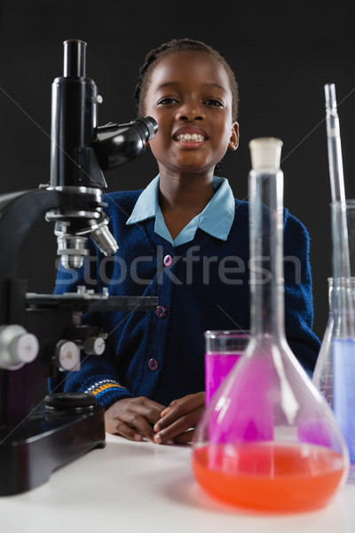 Schülerin Mikroskop schwarz Porträt Kind Bildung Stock foto © wavebreak_media