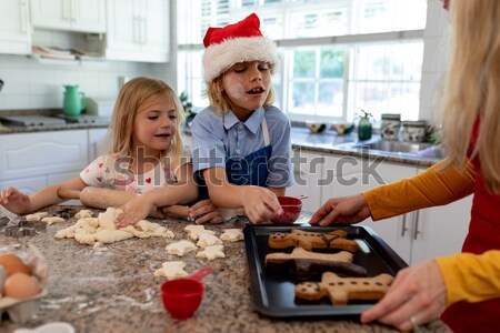 Granddaughter kneading dough Stock photo © wavebreak_media