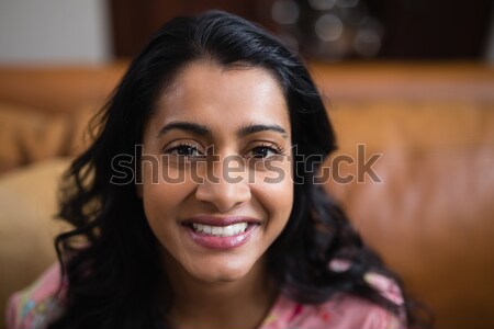Stock photo: Female potter smiling in pottery workshop