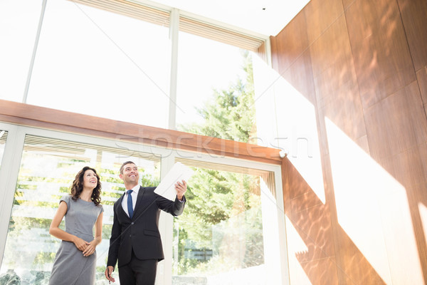 Real-estate agent showing young woman new home Stock photo © wavebreak_media