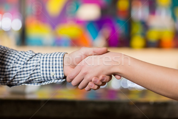 Couple holding hands in bar Stock photo © wavebreak_media