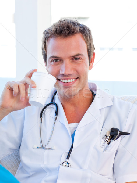 Smiling doctor having a break Stock photo © wavebreak_media