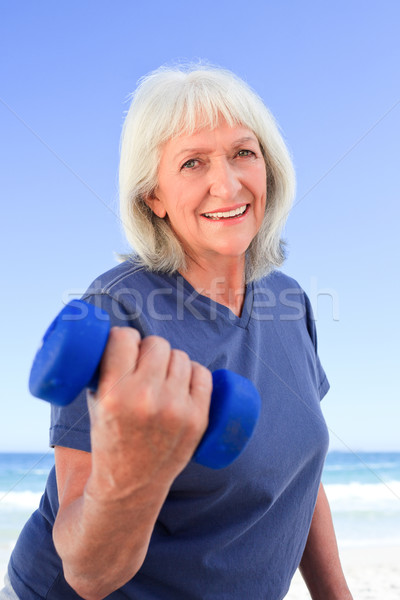 Rijpe vrouw vrouw strand gezondheid vrouwelijke persoon Stockfoto © wavebreak_media