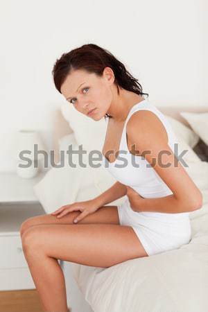 Sitzung Bett Maßnahme Bauch Schlafzimmer Stock foto © wavebreak_media