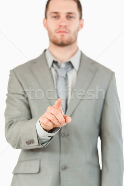 Finger of businessman pointing against a white background Stock photo © wavebreak_media