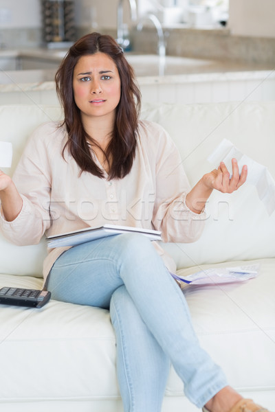 Woman feelingfrustrated about the bills on sofa Stock photo © wavebreak_media
