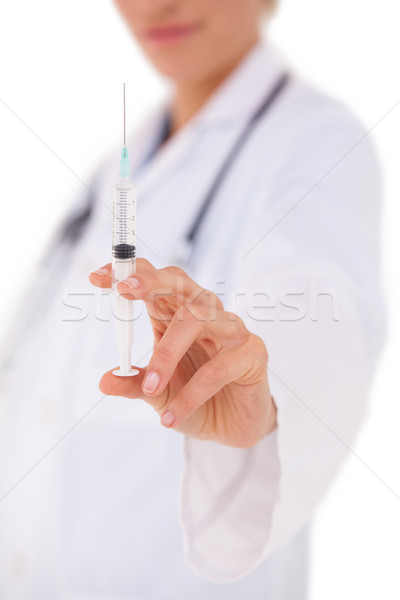 醫生 顯示 注射器 相機 白 女子 商業照片 © wavebreak_media