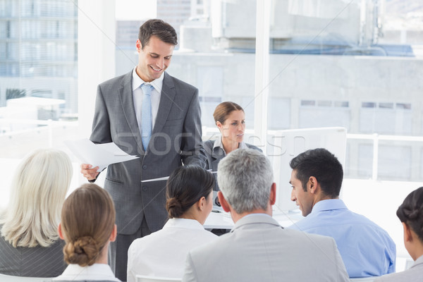 Biznesmen mowy spotkanie biuro kobieta papieru Zdjęcia stock © wavebreak_media