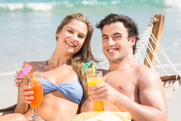 Happy couple napping together in the hammock Stock photo © wavebreak_media