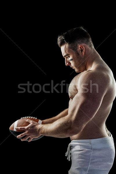 Shirtless amerikaanse voetballer bal zwarte sport Stockfoto © wavebreak_media