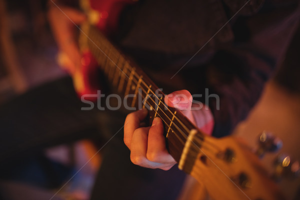 Mid-section of man playing guitar  Stock photo © wavebreak_media