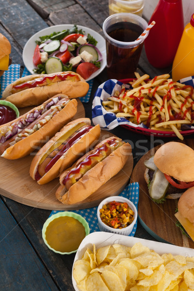 Snacks arranged on wooden table Stock photo © wavebreak_media