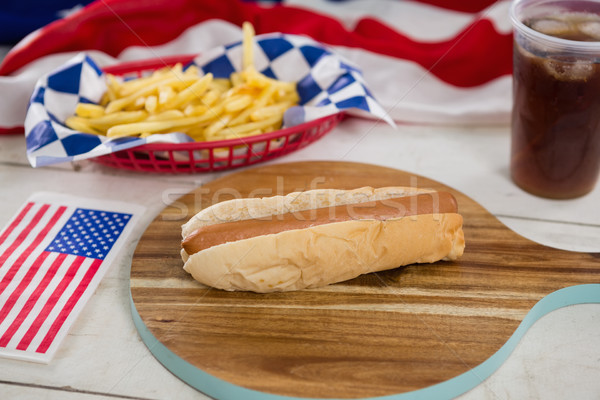 American flag and hot dog on wooden table Stock photo © wavebreak_media