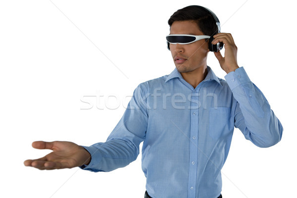 Young businessman using smart glasses Stock photo © wavebreak_media