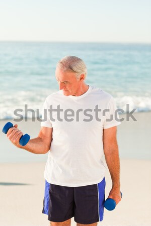 Man standing at the shoreline Stock photo © wavebreak_media